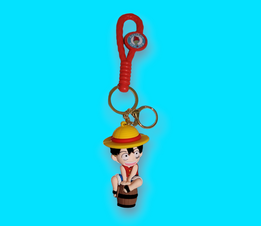 Luffy One Piece on a barrel Keychain.