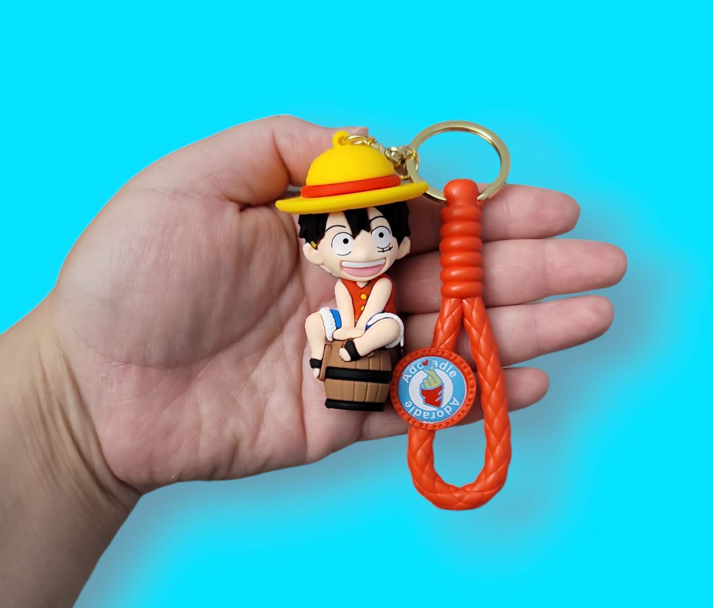 Luffy One Piece on a barrel Keychain.