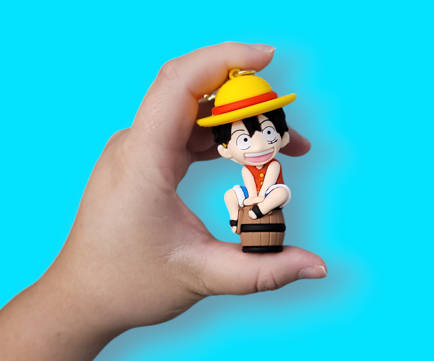 Luffy One Piece on a barrel Keychain.