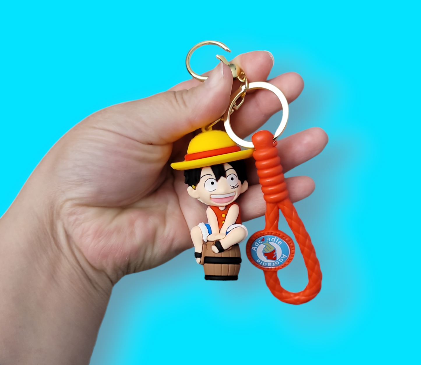 Luffy One Piece on a barrel Keychain.