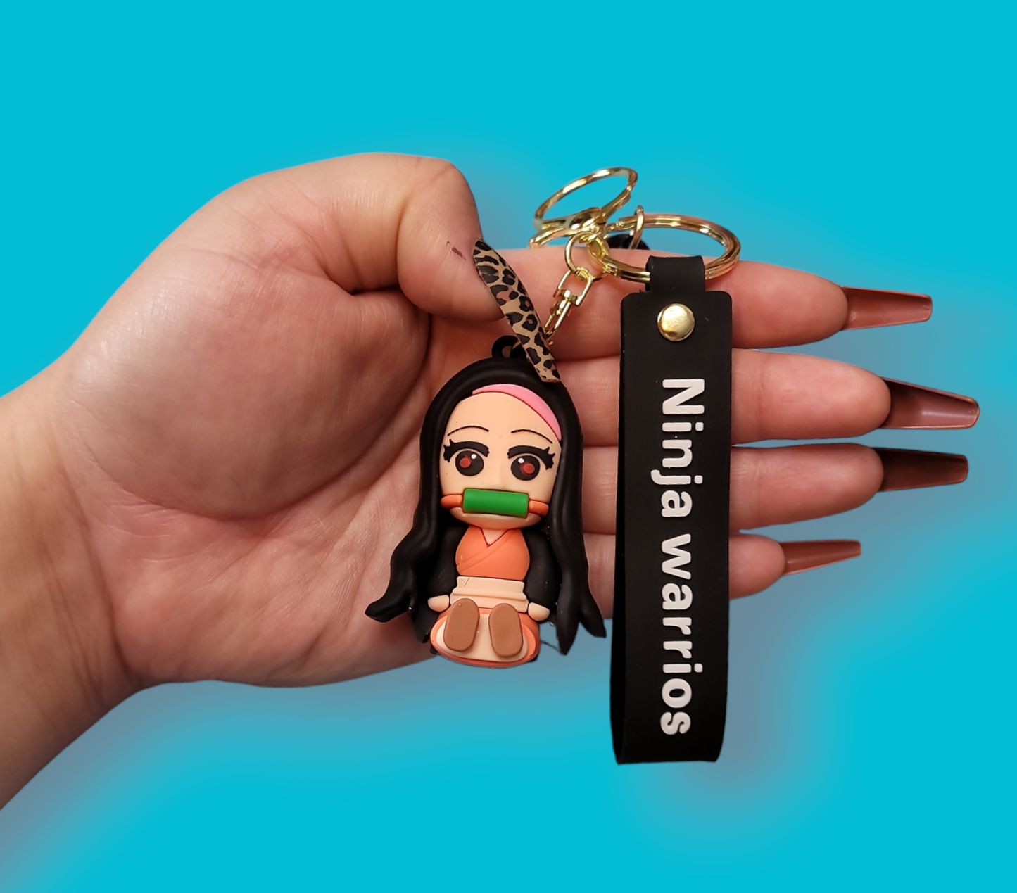 Seating Nezuko Kamado Keychain.