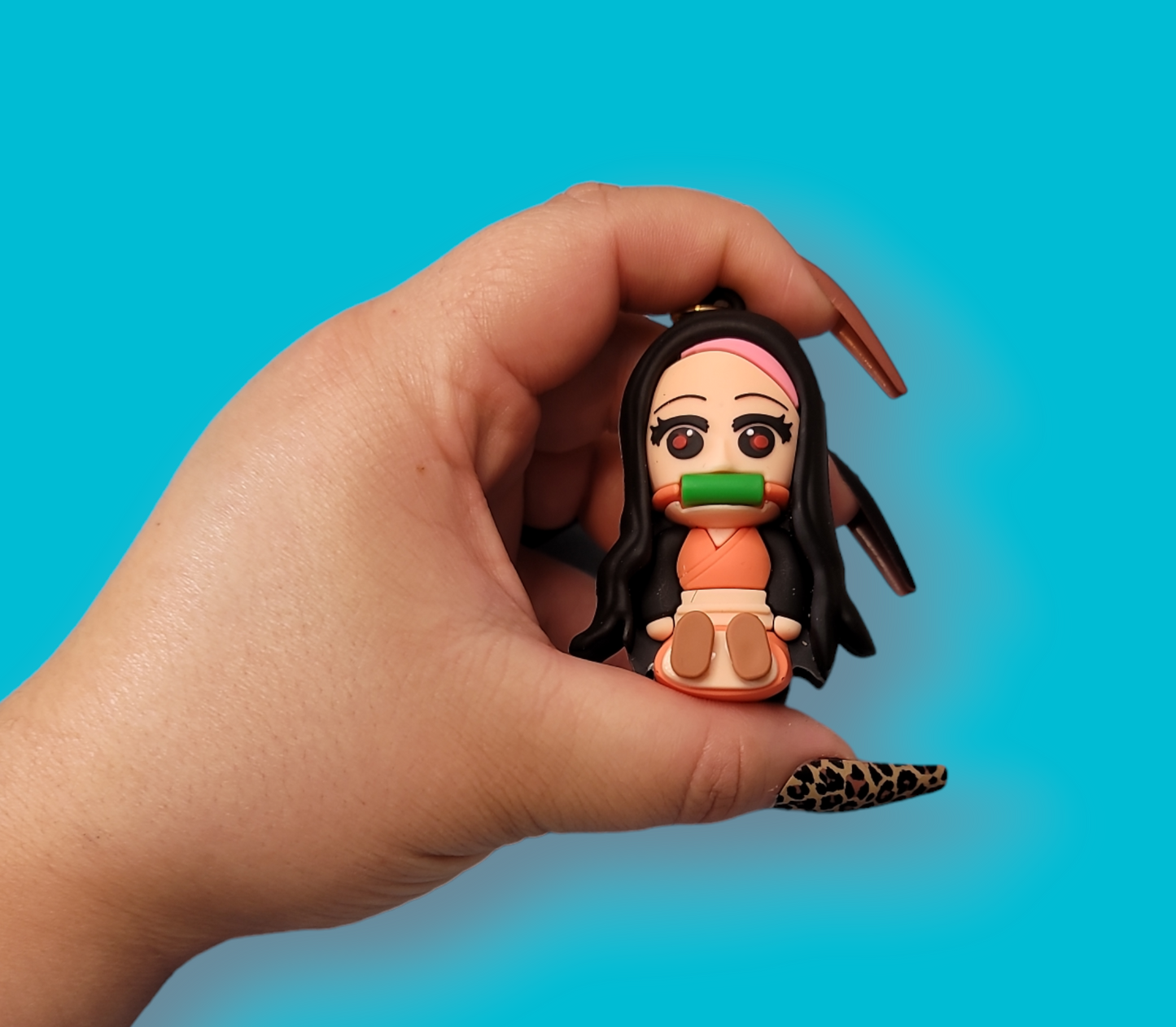 Seating Nezuko Kamado Keychain.