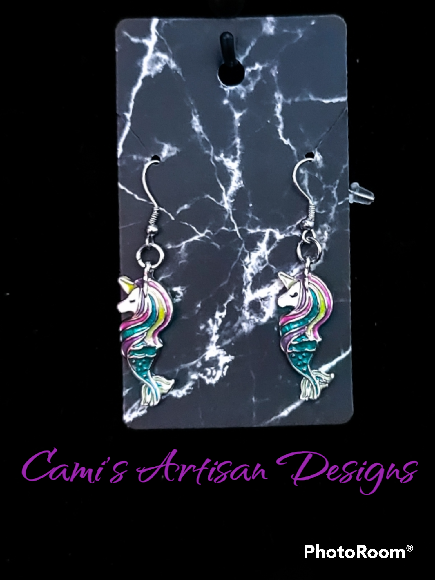 Close up of the unicorn mermaid earrings.